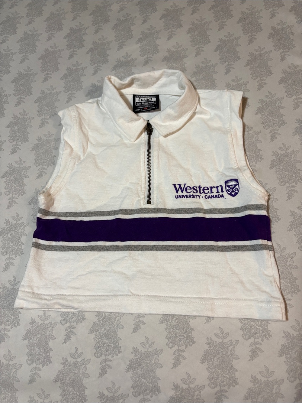Western University White & Purple Sleeveless Zip Polo